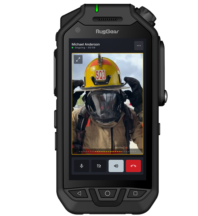 Handset showing a video call with a firefighter in breathing apparatus on screen.